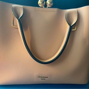 Light pink Dune purse.